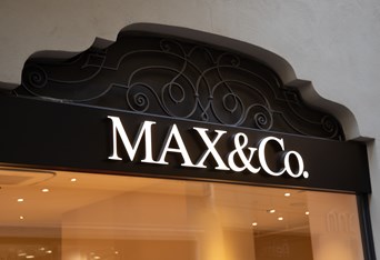 max & co paris facade wall logo brand and text sign at entrance of fashionable textile store of fashion commercial clothing chain